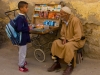 Man Chatting with Boy